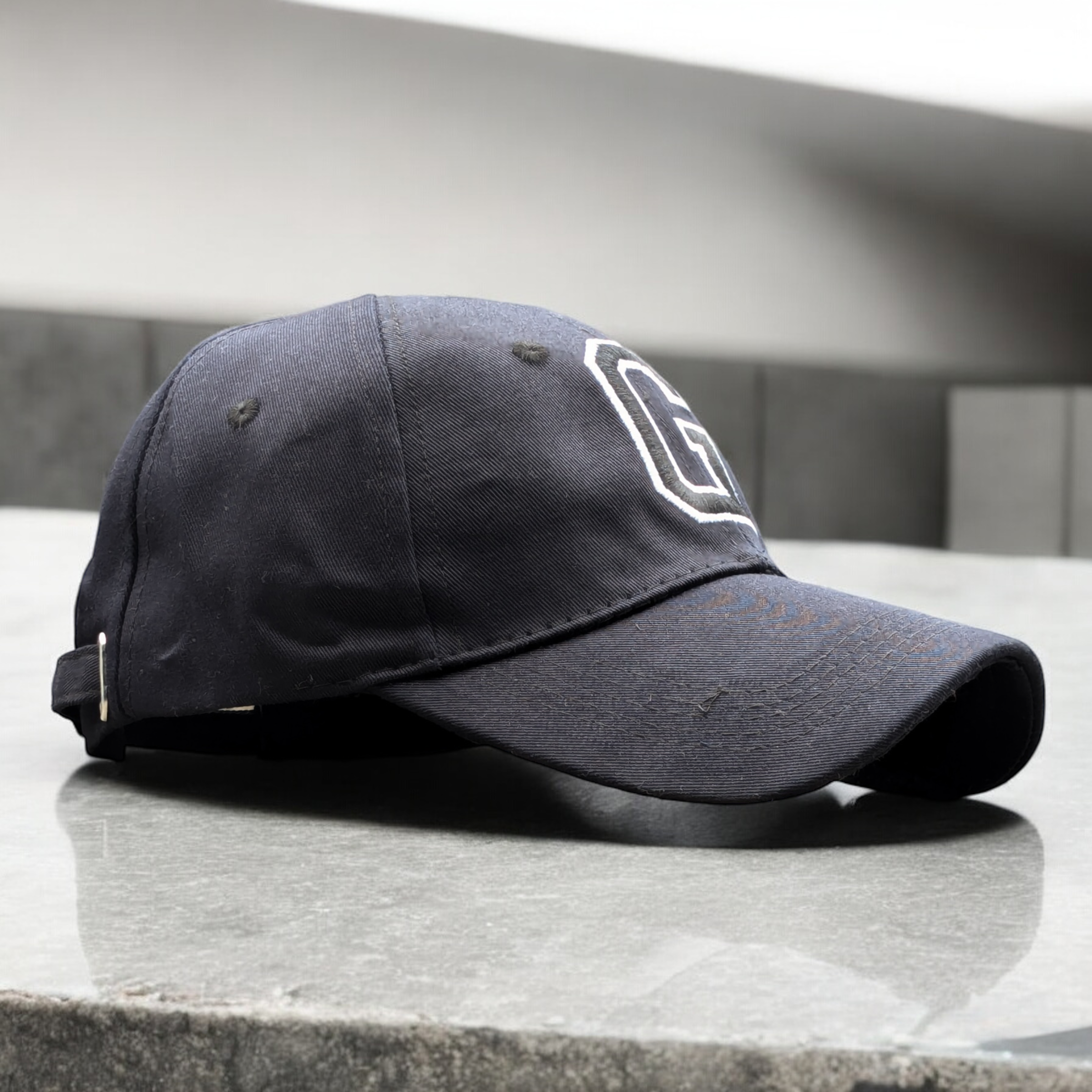 Cap [Letter G]