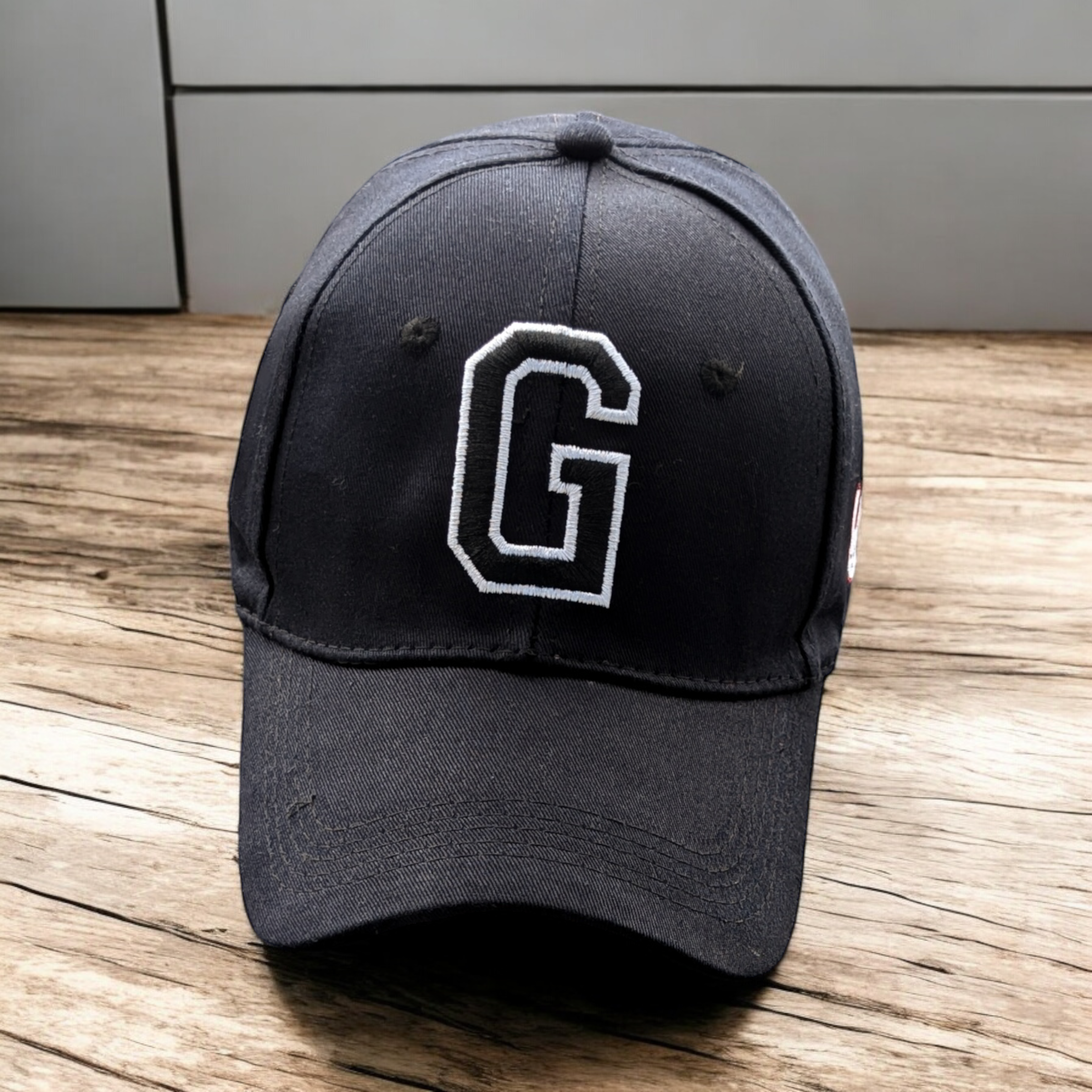 Cap [Letter G]