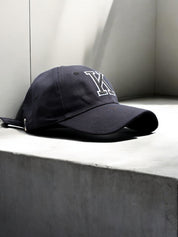 Cap [Letter K]