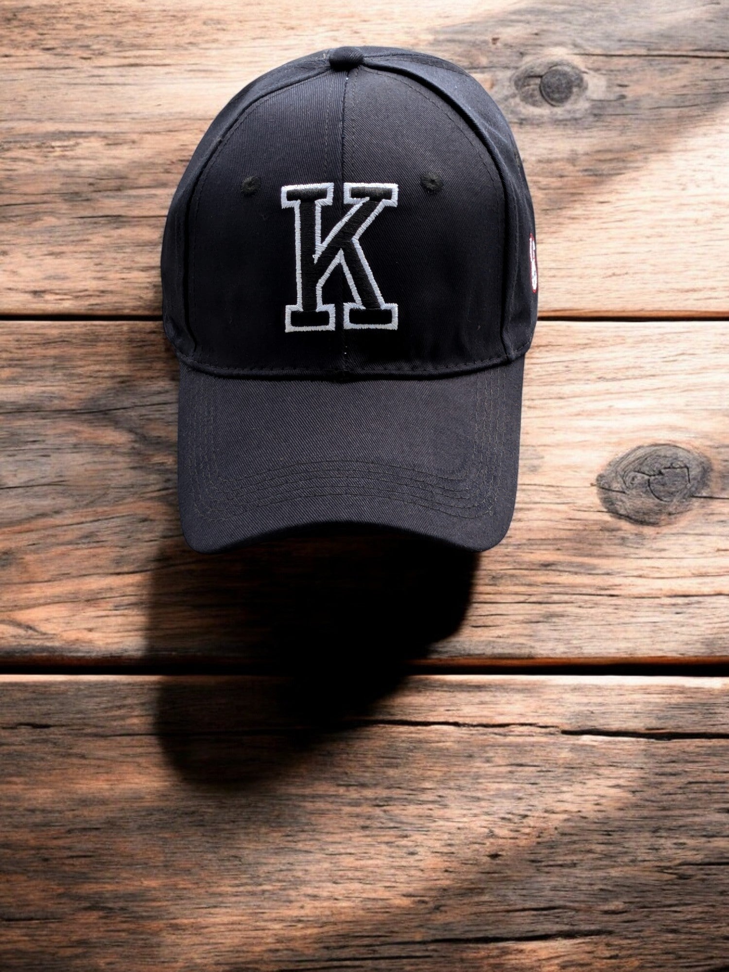 Cap [Letter K]