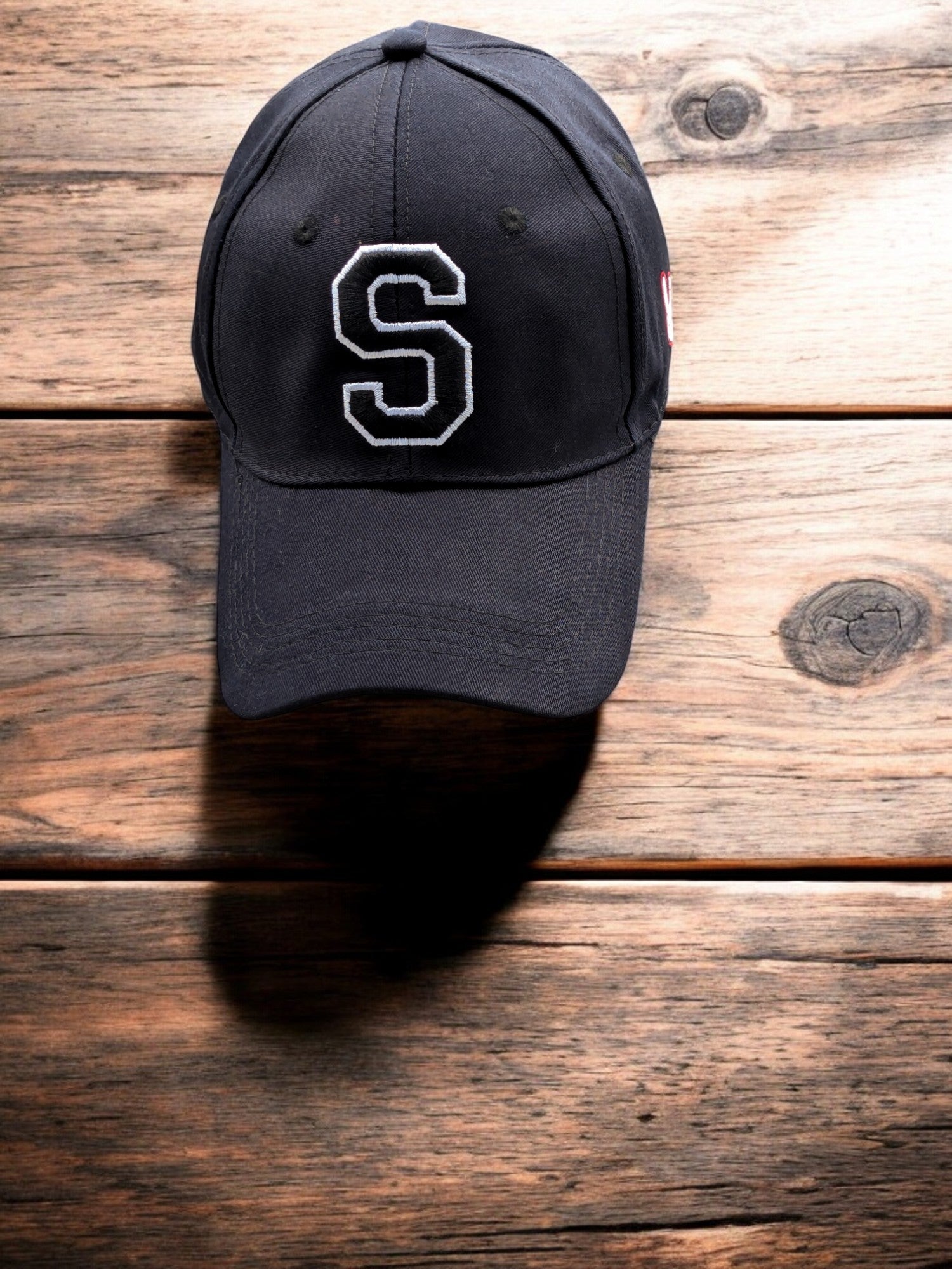 Cap [Letter S]