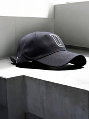 Cap [Letter U]